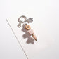 Side angle of the colorful beaded star keychain highlighting bead texture