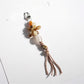 Keypus acrylic beaded flower keychain shown with a blurred background