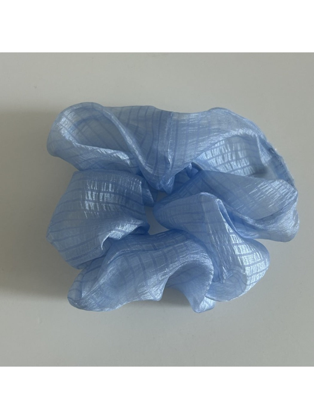 Minimalist sheer tulle scrunchie with soft ruffled texture
