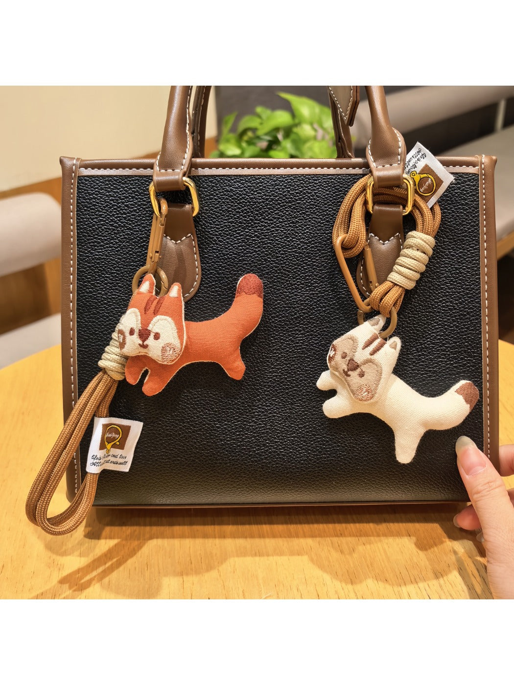 Close-up of Keypus cute squirrel charm keychain with detailed fur texture