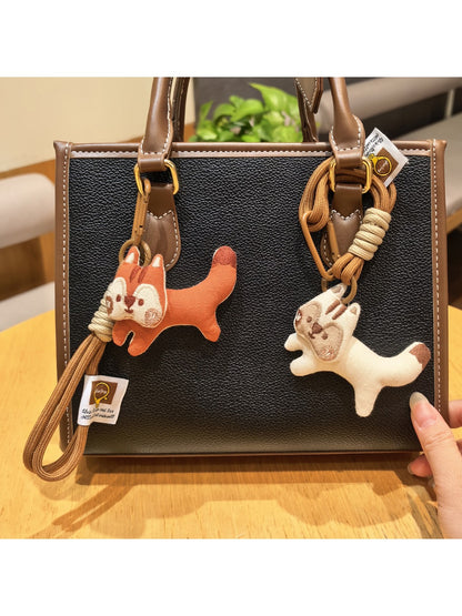 Close-up of Keypus cute squirrel charm keychain with detailed fur texture