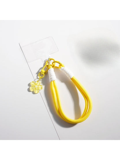 Side view of the multicolored rope flower keychain showing texture and detail