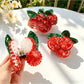 Side view of Beau 3D fruit shape claw clip showing curved claw design