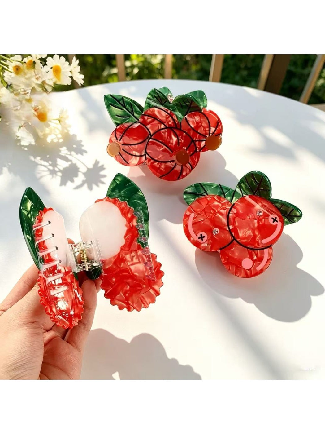 Side view of Beau 3D fruit shape claw clip showing curved claw design