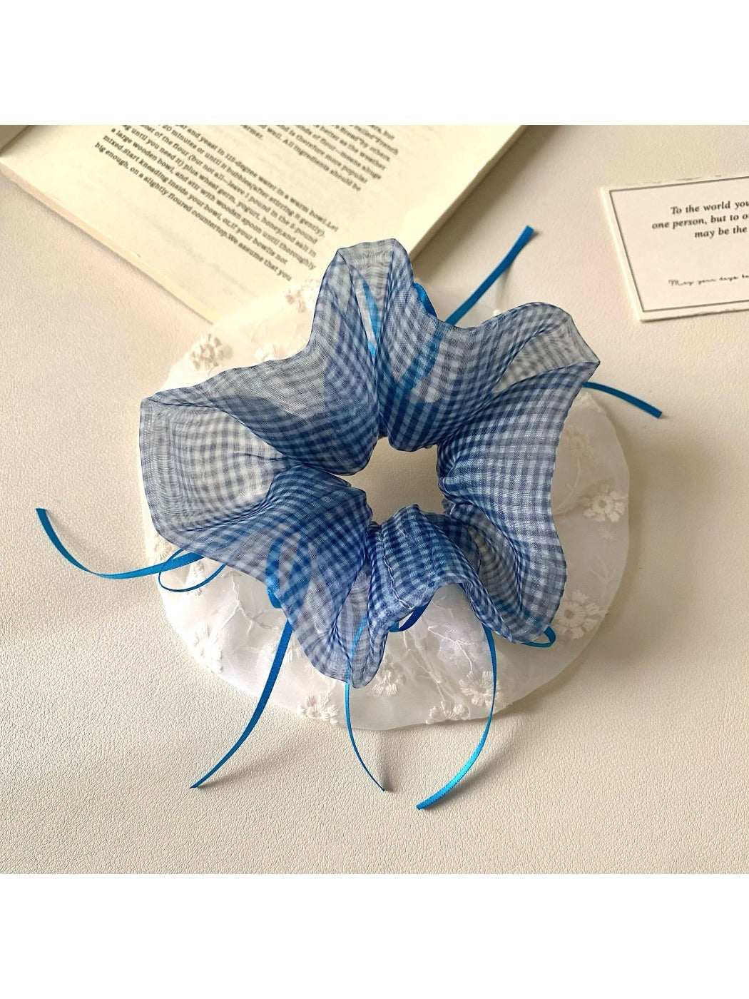 Gifty plaid hair scrunchie displayed flat to show full pattern and shape