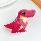 Green frog shaped hair claw clip with detailed eyes and mouth