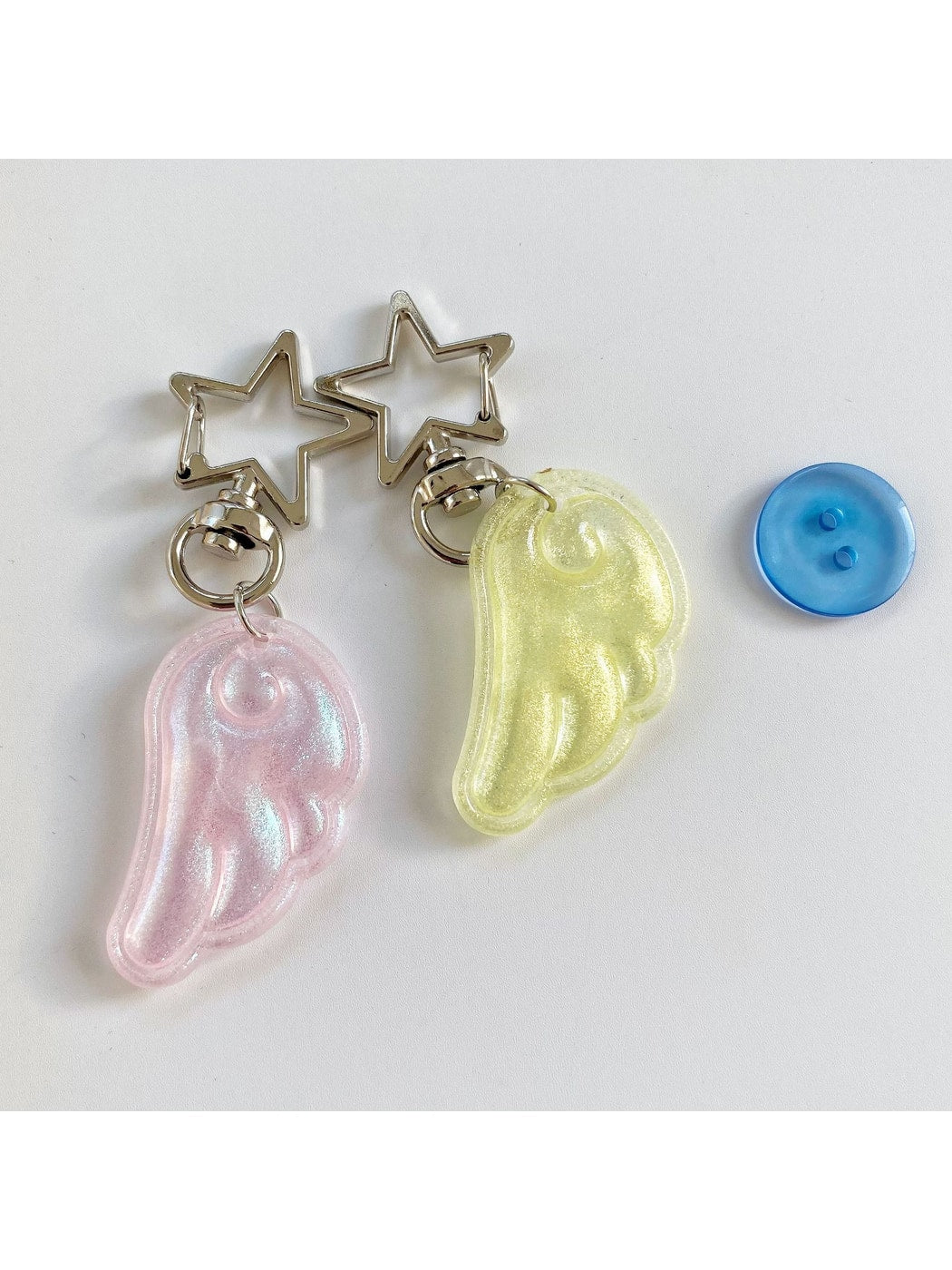 Keypus - Shimmery Acrylic Angel Wing Star Keychain