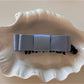 Back of Beau vintage bow hair clip showing gold-tone metal clip mechanism