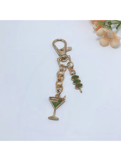 Close-up of alloy cup keychain showing textured surface and keyring attachment