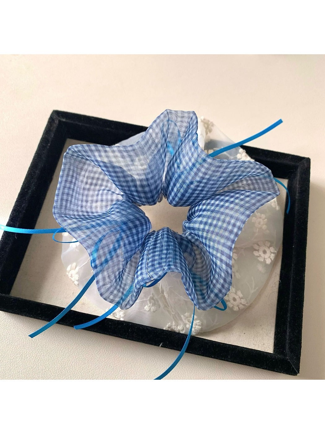 Gifty plaid hair scrunchie styled on a ponytail with visible double layers