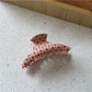Top view of Beau polka dot claw clip showing clasp mechanism