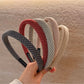 Gifty chic minimalist plaid headband in neutral tones displayed on a white background