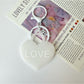 Solid color heart-shaped pendant keychain in black with silver keyring