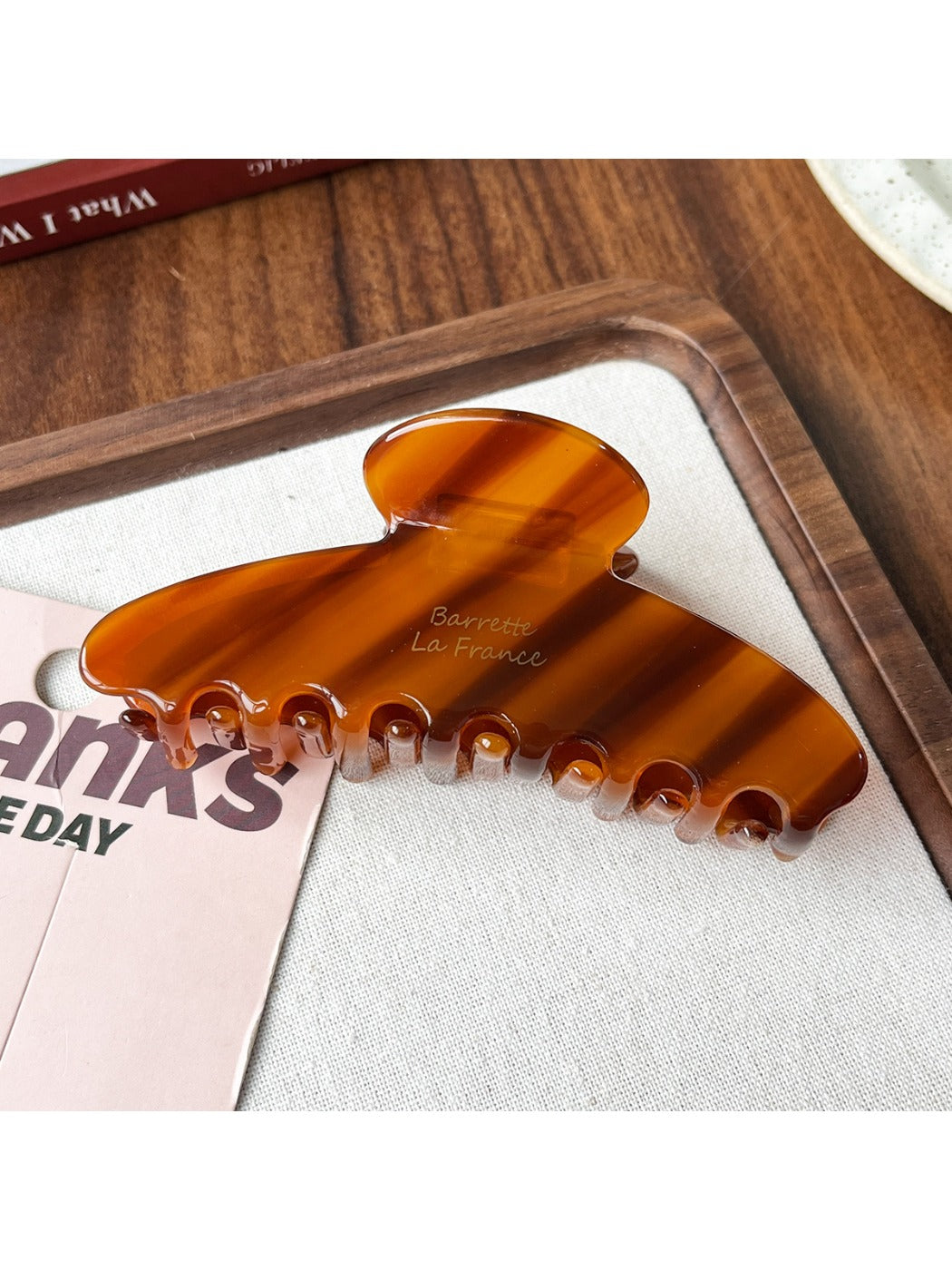 Beau elegant acetate claw clip packaged in branded box with minimalist design