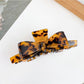 Beau minimalist bow claw clip shown from the back with clasp visible