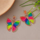 Side view of butterfly shaped drop earrings showing delicate wing details