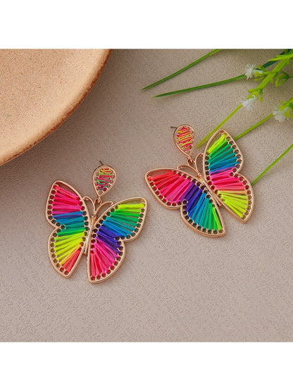 Side view of butterfly shaped drop earrings showing delicate wing details