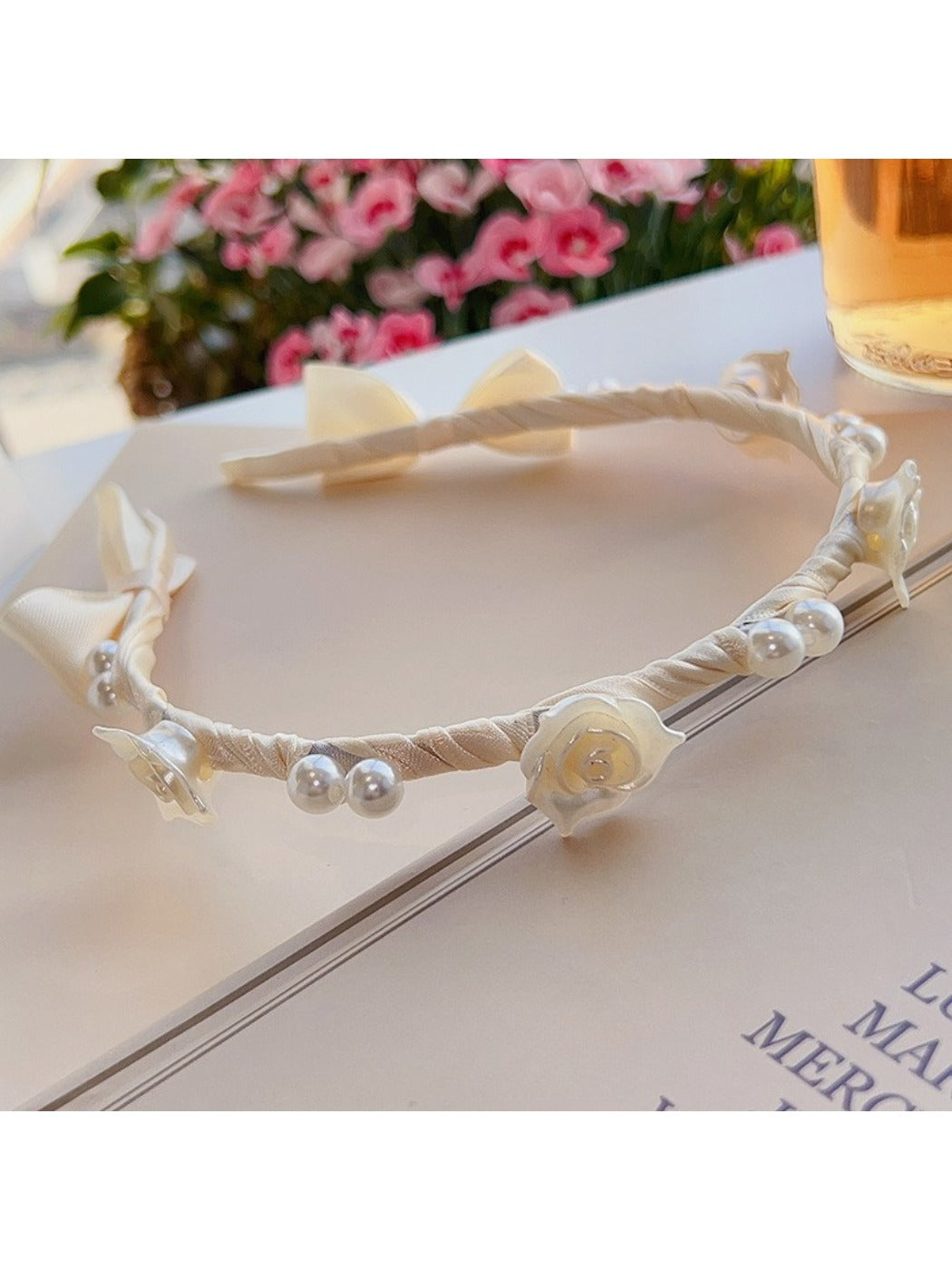 Model wearing the chic soft white headband styled with casual outfit