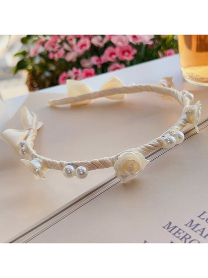 Model wearing the chic soft white headband styled with casual outfit