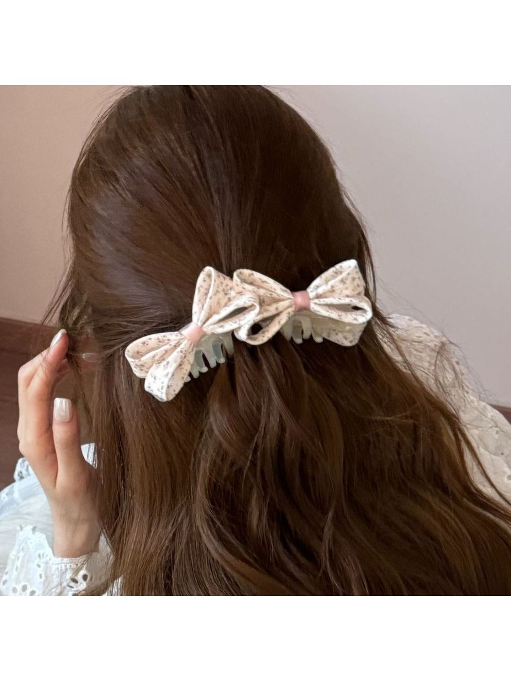 Close-up of Beau printed bow banana clip showing fabric texture and clasp