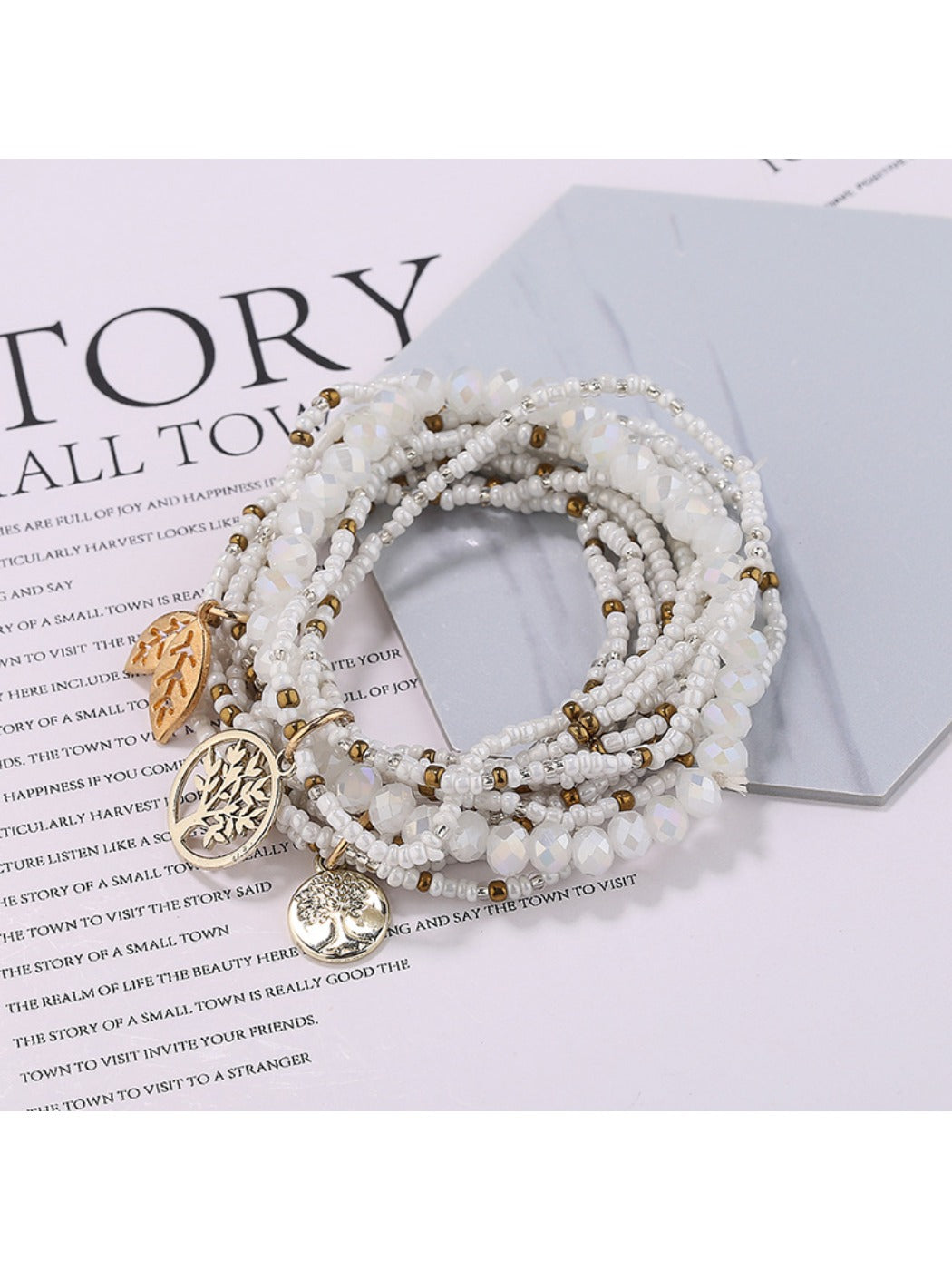 Lovra bracelet worn on wrist highlighting the leaf pendant and bead arrangement
