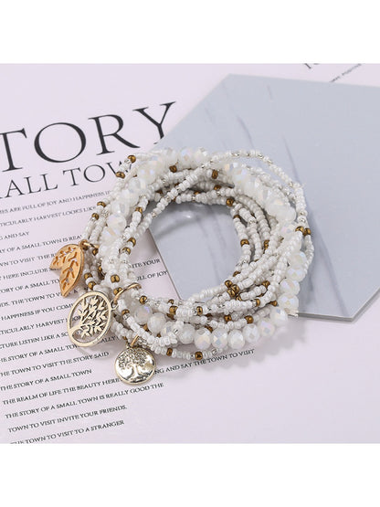 Lovra bracelet worn on wrist highlighting the leaf pendant and bead arrangement
