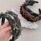 Gifty plaid bow headband on white background showing front view