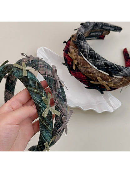 Gifty plaid bow headband on white background showing front view