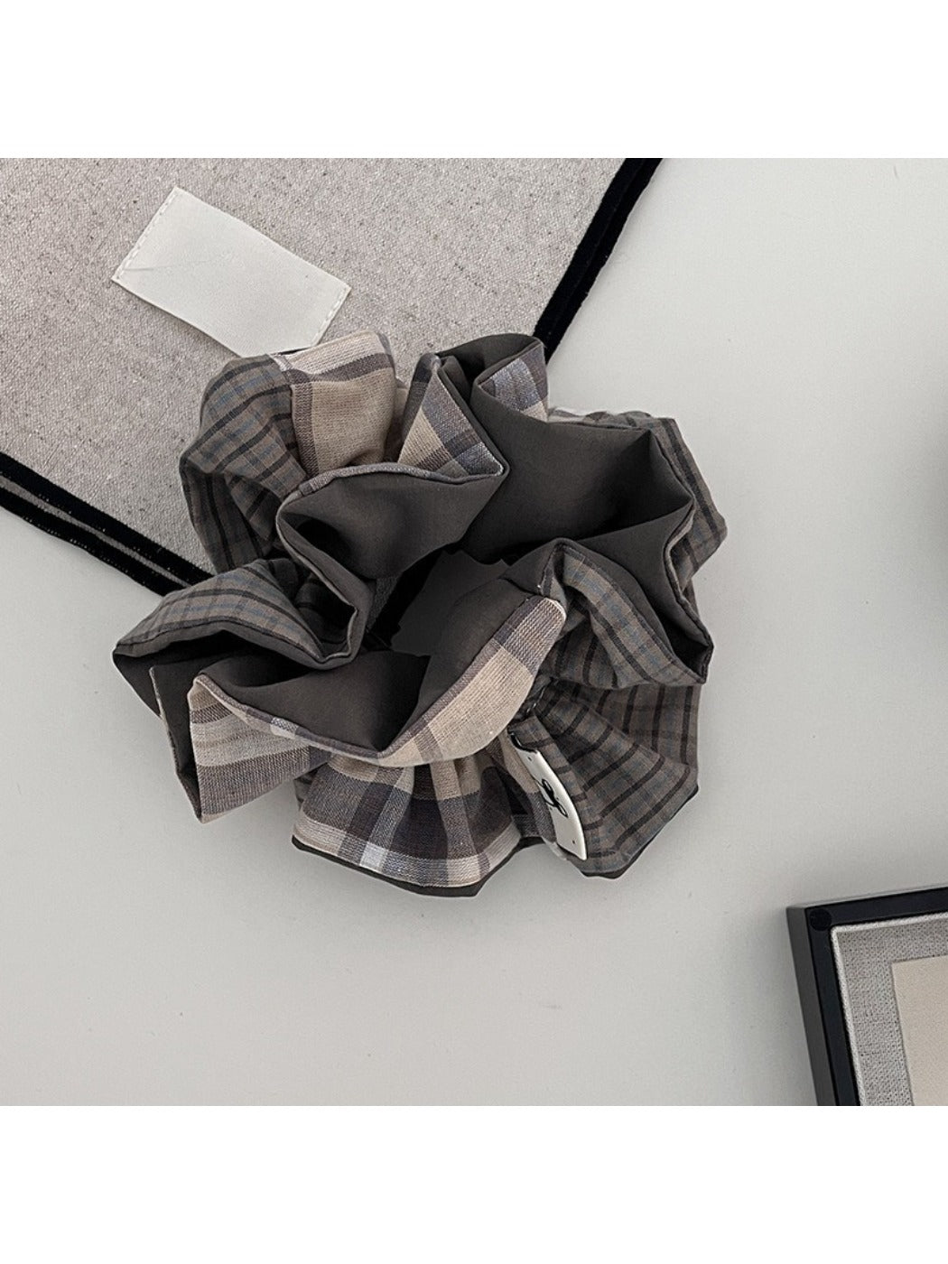 Gifty creative plaid patchwork scrunchie displayed on a white background