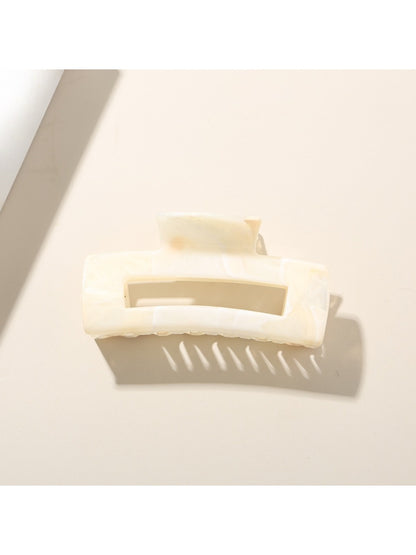Beau hair clip open, displaying the metal clasp and hinge details