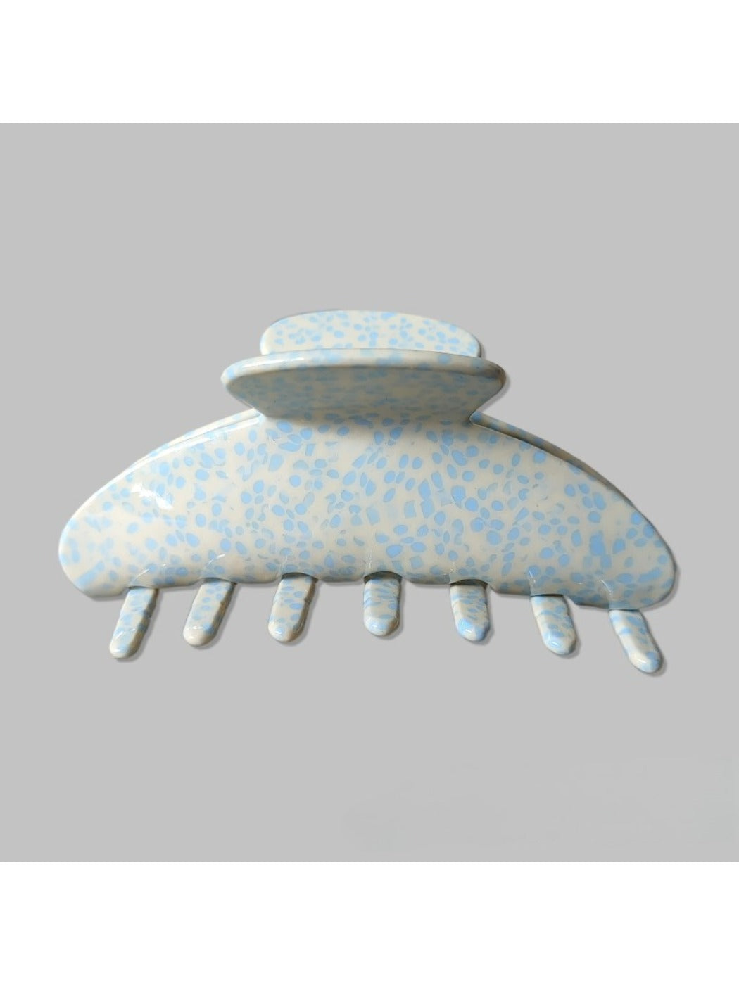 Close-up of the clip mechanism on Beau Irregular Polka Dot Claw Clip