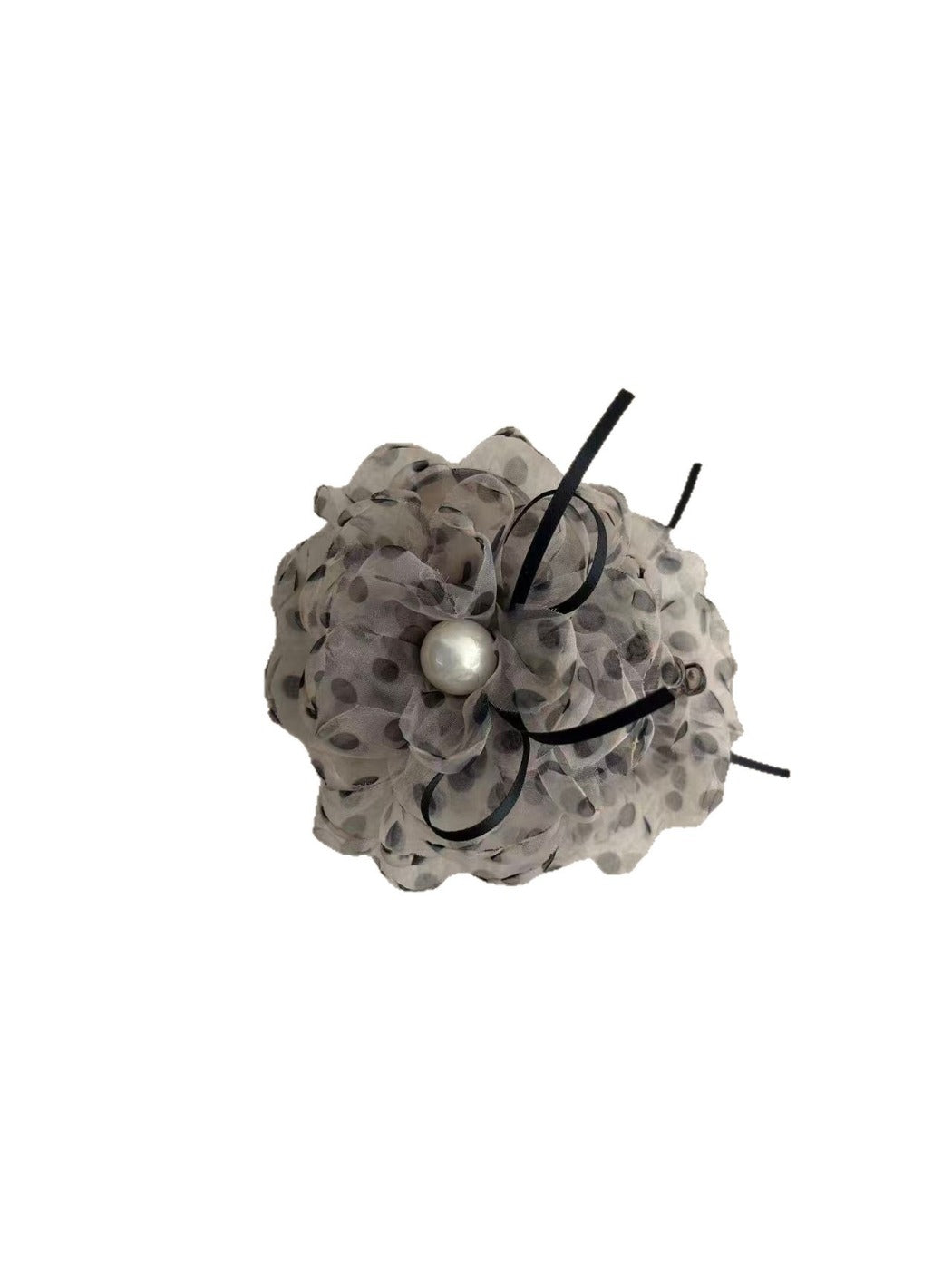 Close-up of Beau polka dot mesh hair clip showing fine mesh texture
