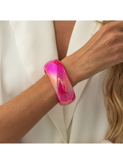 Lovra colorful bangle bracelet in natural light showing color gradient