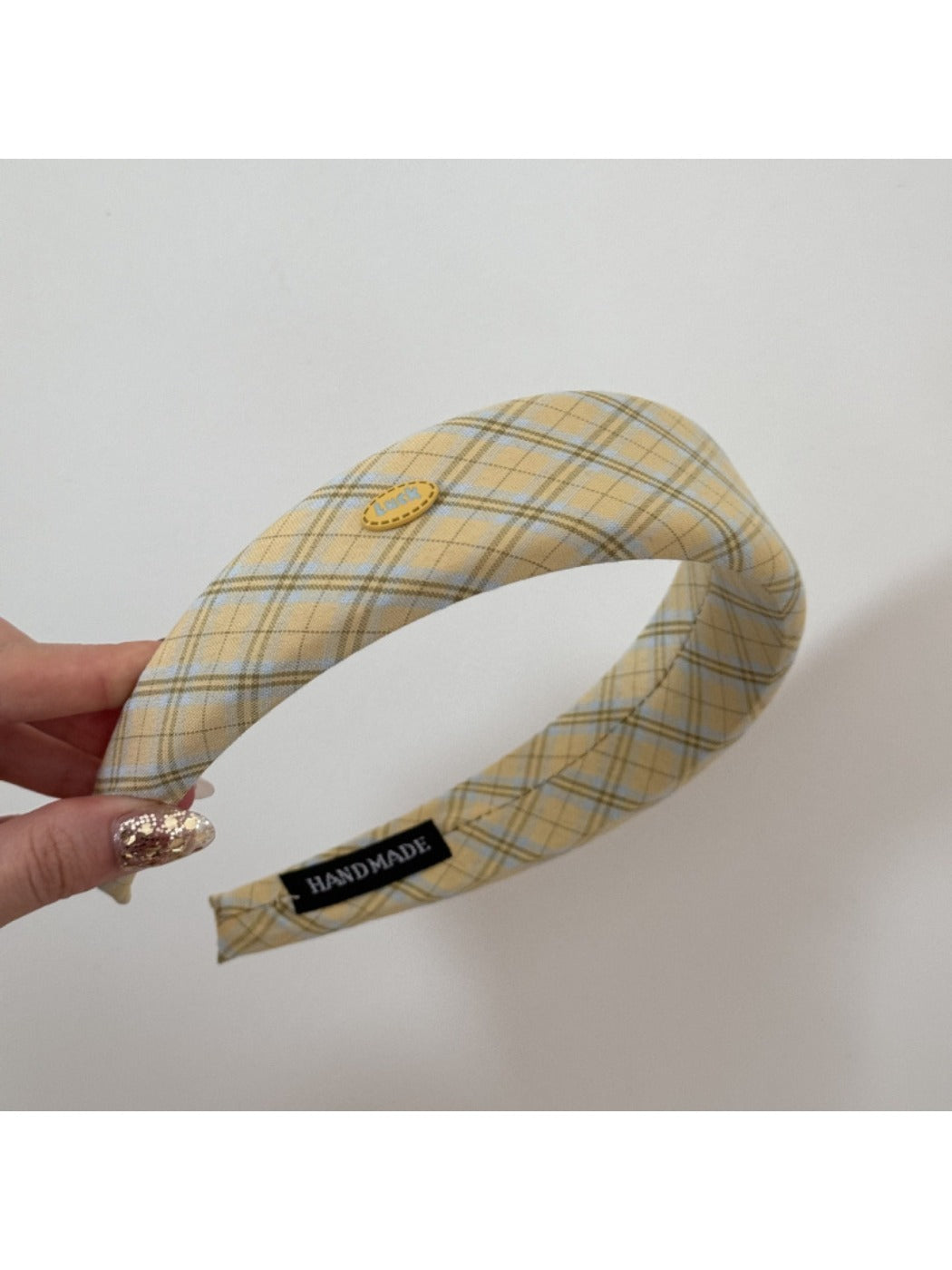 Gifty Sweet Plaid headband folded to show inner lining and fabric details