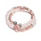 Lovra elegant bracelet with pink and neutral colorblock beads laid flat on a surface