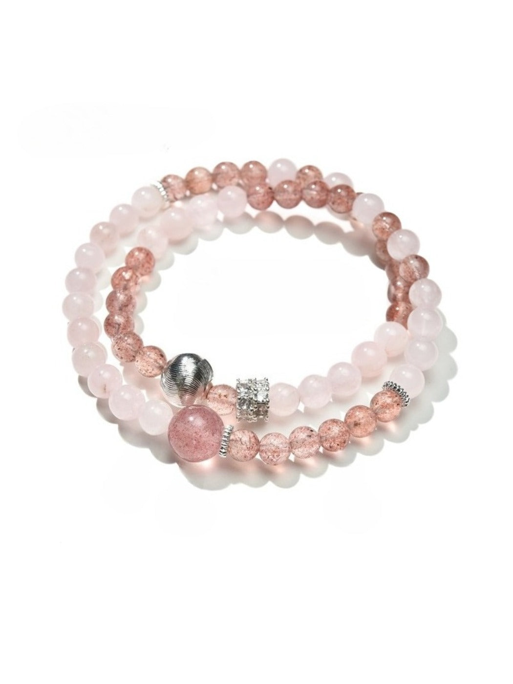 Lovra elegant bracelet with pink and neutral colorblock beads laid flat on a surface