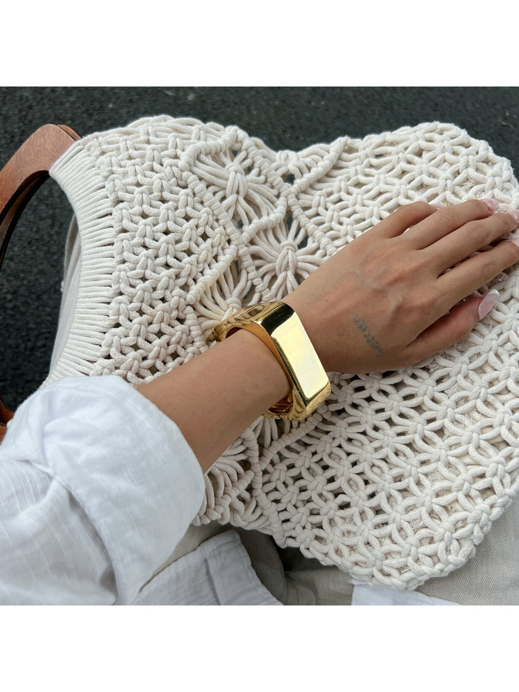 Artistic angle of Lovra Chic Irregular Bangle Bracelet emphasizing irregular design