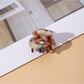 Beau - Small Oval Cut Out Hair Claw Clip