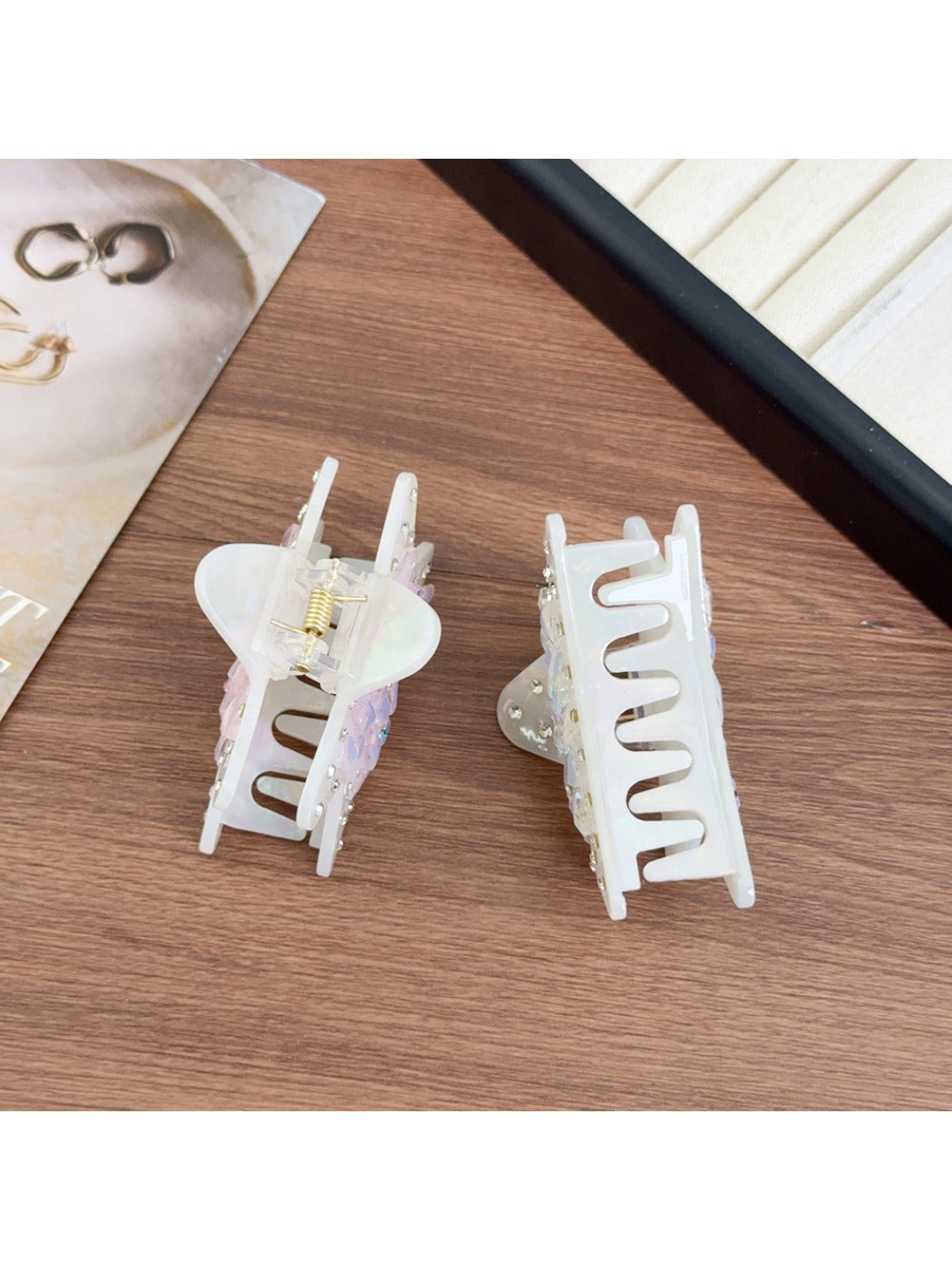 Close-up of Beau shark claw clip showing geometric design and matte finish