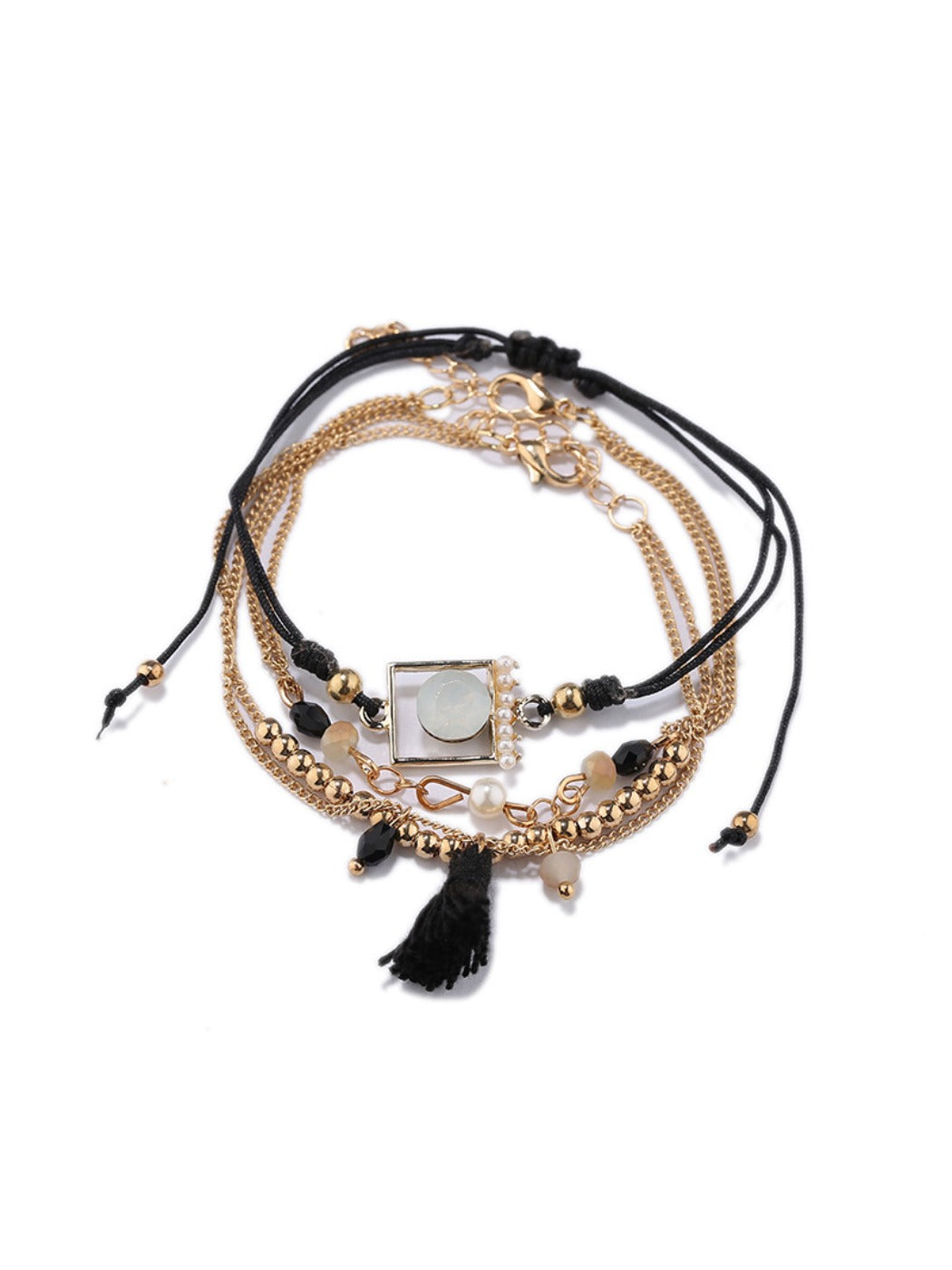 Lovra tassel pendant small bead bracelet displayed on a white background