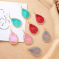 Close-up of Earedge Cord Woven Teardrop Earrings with intricate woven design