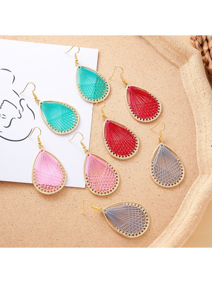 Close-up of Earedge Cord Woven Teardrop Earrings with intricate woven design