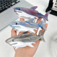 Close-up of Beau shark shaped hair claw clip showing smooth matte finish