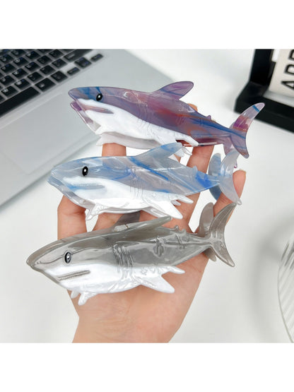 Close-up of Beau shark shaped hair claw clip showing smooth matte finish