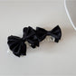 Beau satin bow banana clip displayed open showing clip mechanism