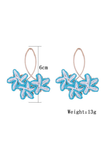 Side view of Earedge Sweet Flower Shaped Drop Earrings highlighting the drop design