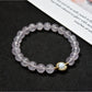 Lovra bracelet worn on wrist, displaying delicate pastel beads and minimalist design