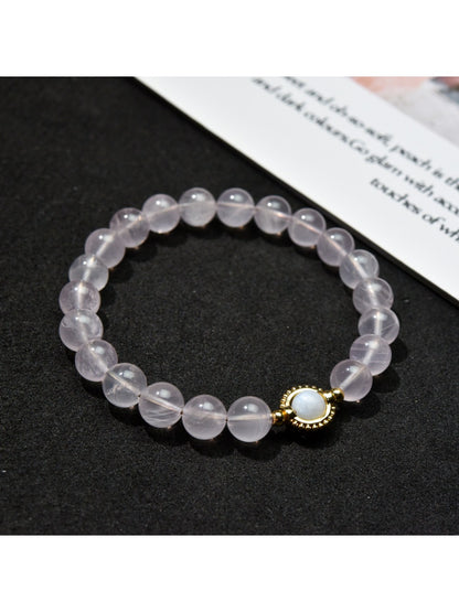 Lovra bracelet worn on wrist, displaying delicate pastel beads and minimalist design