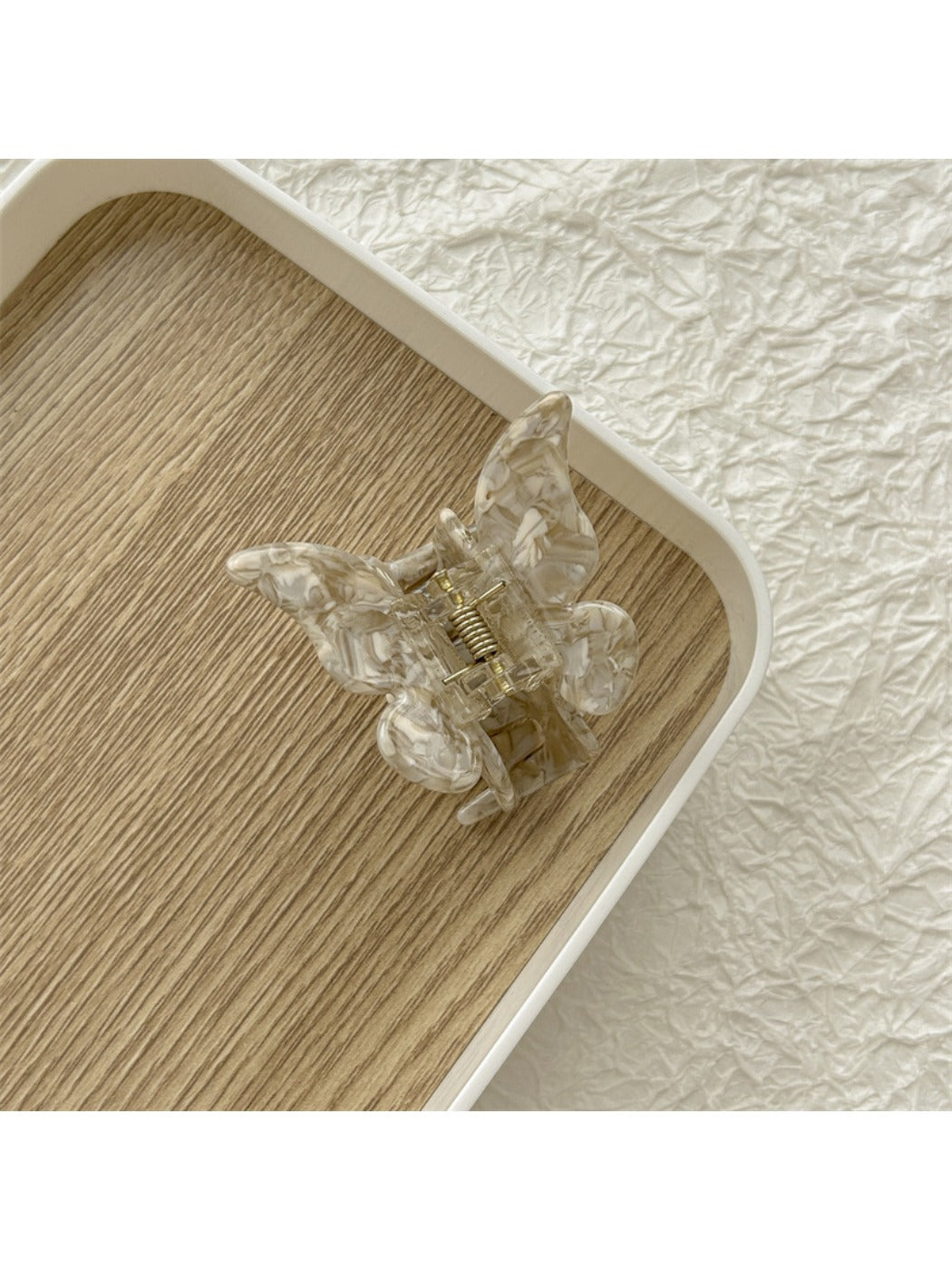 Beau butterfly claw clip clipped onto hair showing usage