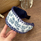 Side view of Gifty bohemian style headband highlighting fabric texture